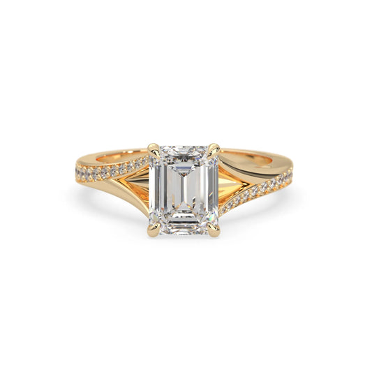 yellow Gold ring with a large diamond on a white background