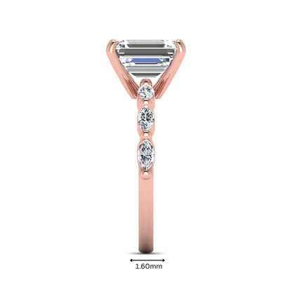 IGI Certified 2.62 carat Emerald cut lab grown diamond engagement ring with marquise cut side diamonds in rose gold.