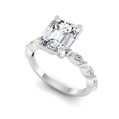 IGI Certified 2.62 carat Emerald cut lab grown diamond engagement ring with marquise cut side diamonds in white gold.