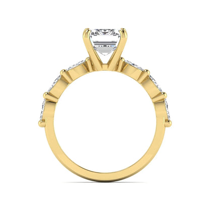 IGI Certified 2.62 carat Emerald cut lab grown diamond engagement ring with marquise cut side diamonds in yellow gold.