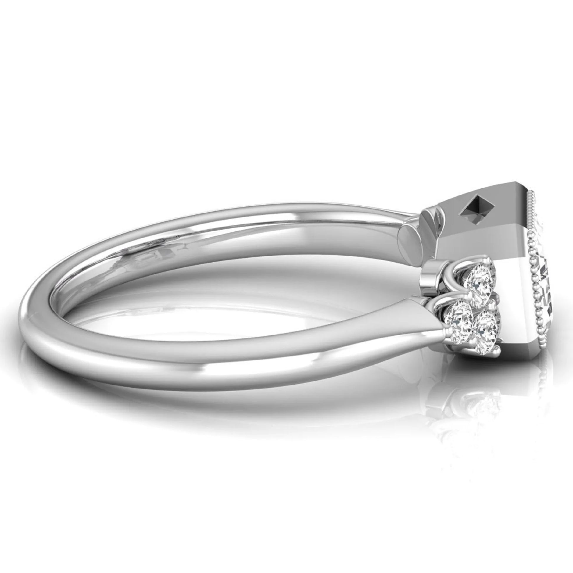 Emerald cut lab grown diamond engagement ring featuring a milgrain bezel setting with round side stone clusters in white gold.