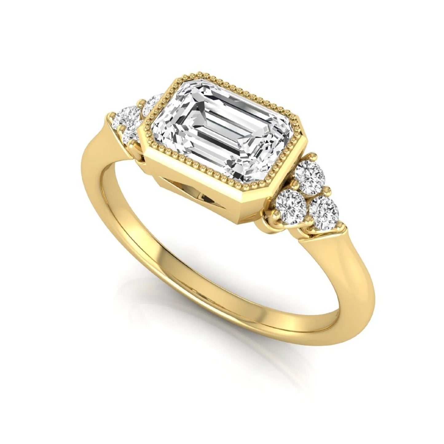 Emerald cut lab grown diamond engagement ring featuring a milgrain bezel setting with round side stone clusters in yellow gold.