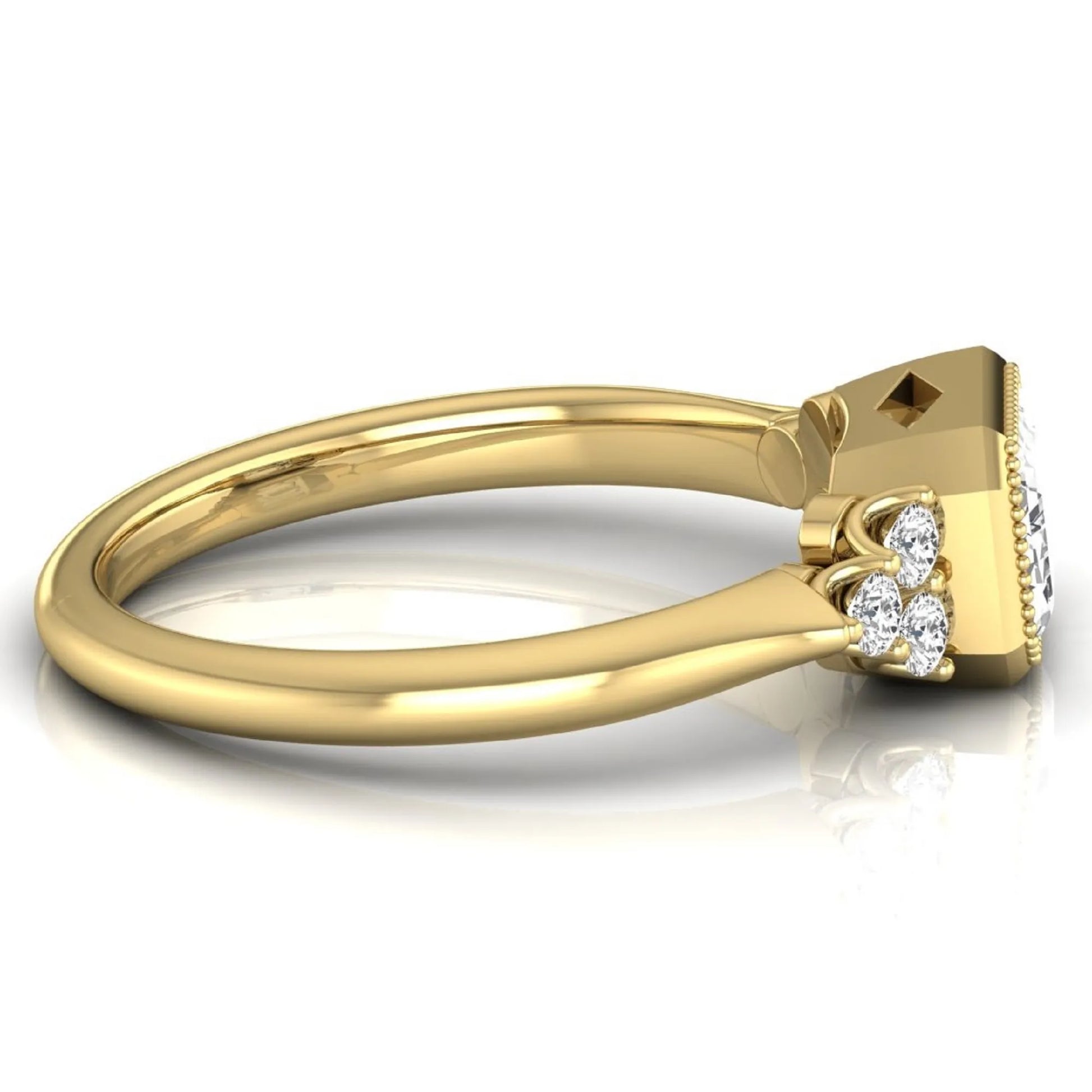 Emerald cut lab grown diamond engagement ring featuring a milgrain bezel setting with round side stone clusters in yellow gold.