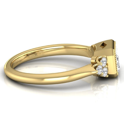 Emerald cut lab grown diamond engagement ring featuring a milgrain bezel setting with round side stone clusters in yellow gold.