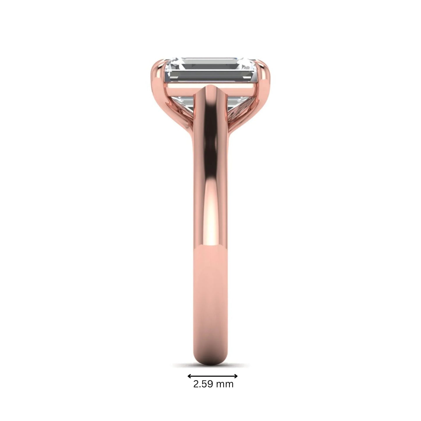 Emerald cut lab grown diamond solitaire engagement ring with a four-prong setting and polished tapered rose gold band.