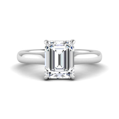 Emerald cut lab grown diamond solitaire engagement ring with a four-prong setting and polished tapered white gold band.