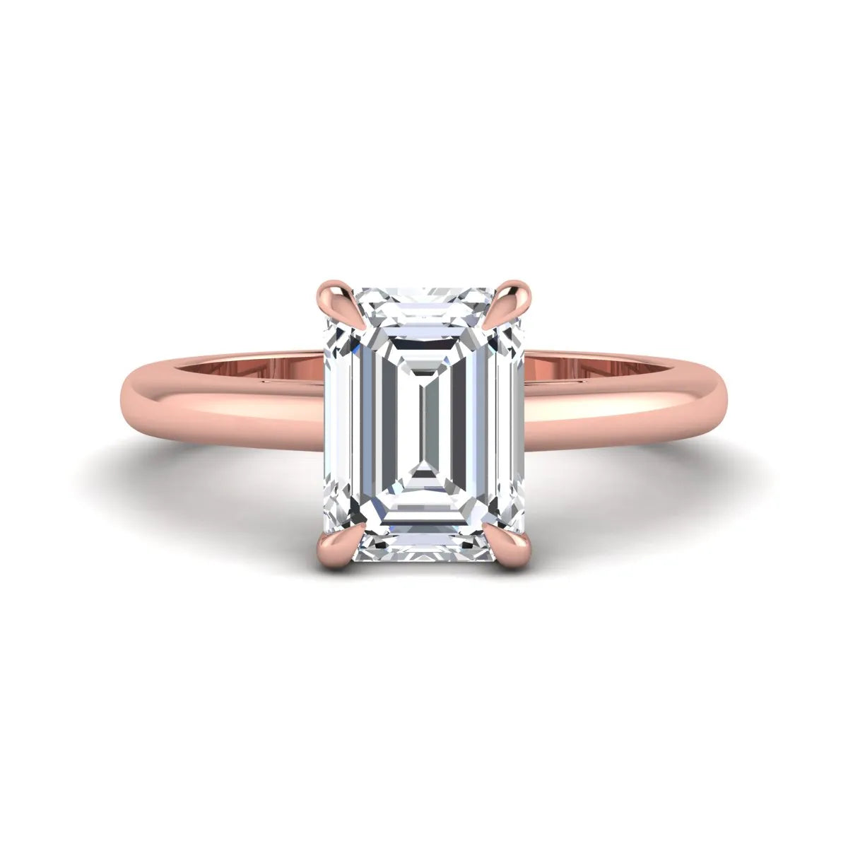 Emerald Cut Solitaire Lab Grown Diamond Engagement Ring featuring a 9.05 × 6.62 mm IGI Certified emerald-cut diamond in a four-prong cathedral setting with a polished rose gold band.