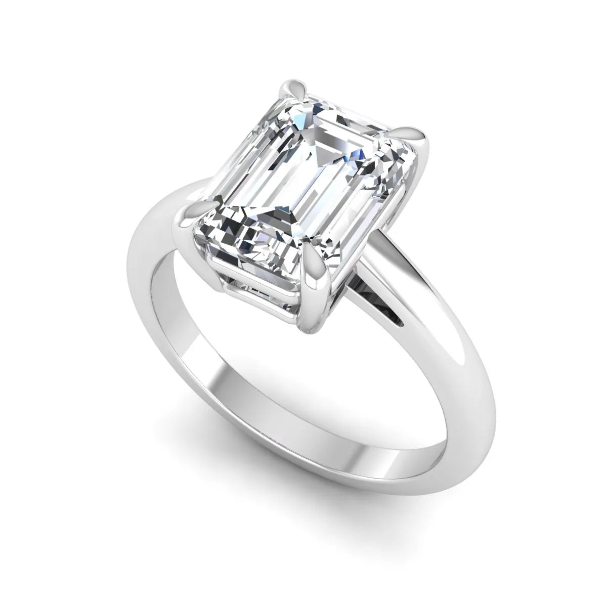 Emerald Cut Solitaire Lab Grown Diamond Engagement Ring featuring a 9.05 × 6.62 mm IGI Certified emerald-cut diamond in a four-prong cathedral setting with a polished white gold band.