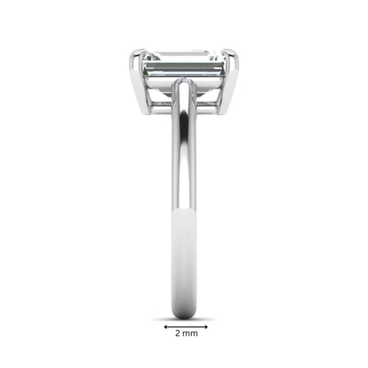 Emerald Cut Solitaire Lab Grown Diamond Engagement Ring featuring a 9.05 × 6.62 mm IGI Certified emerald-cut diamond in a four-prong cathedral setting with a polished white gold band.