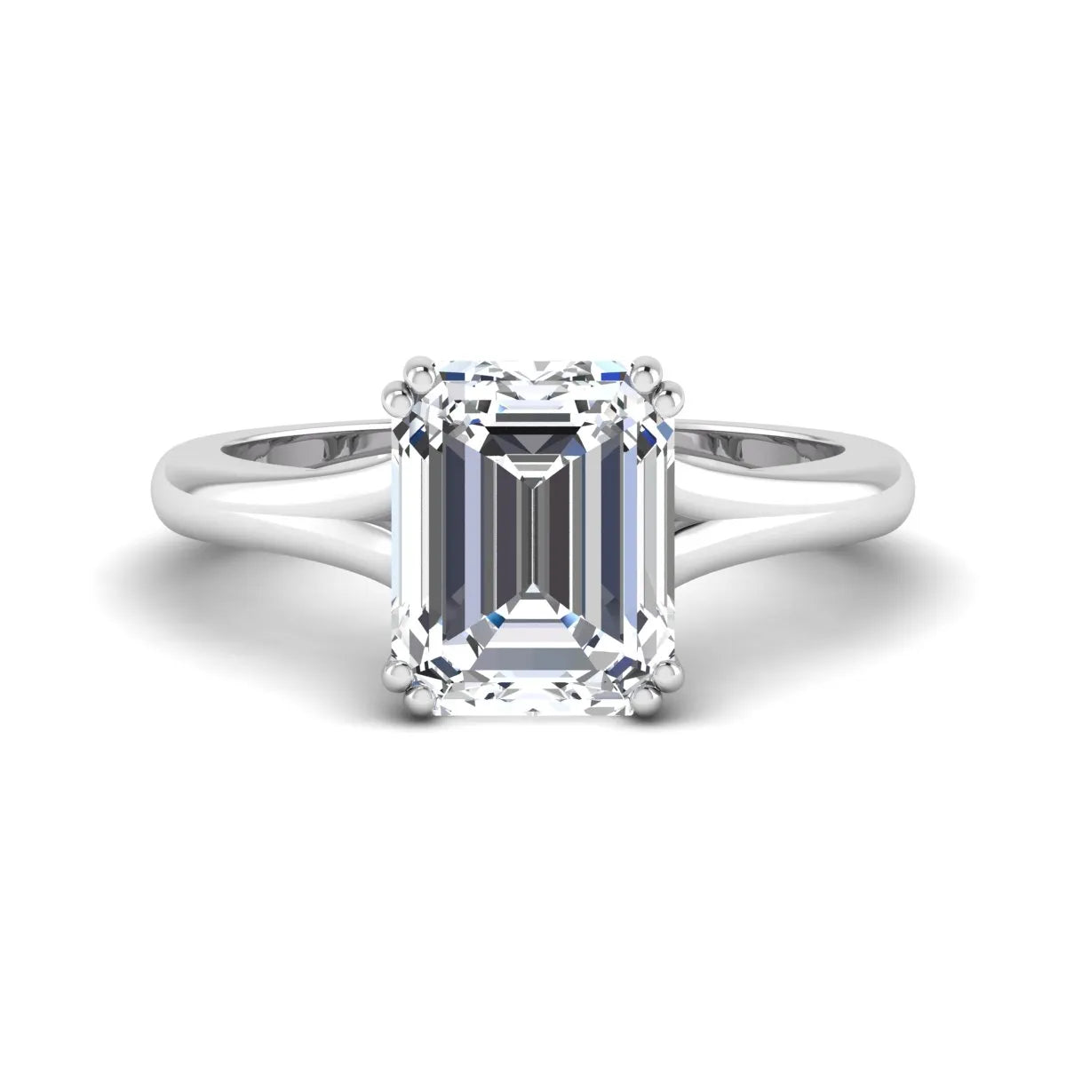 Emerald Cut Lab Grown Diamond Solitaire Engagement Ring featuring an IGI certified emerald cut center diamond in a four-prong setting with a white gold tone band.