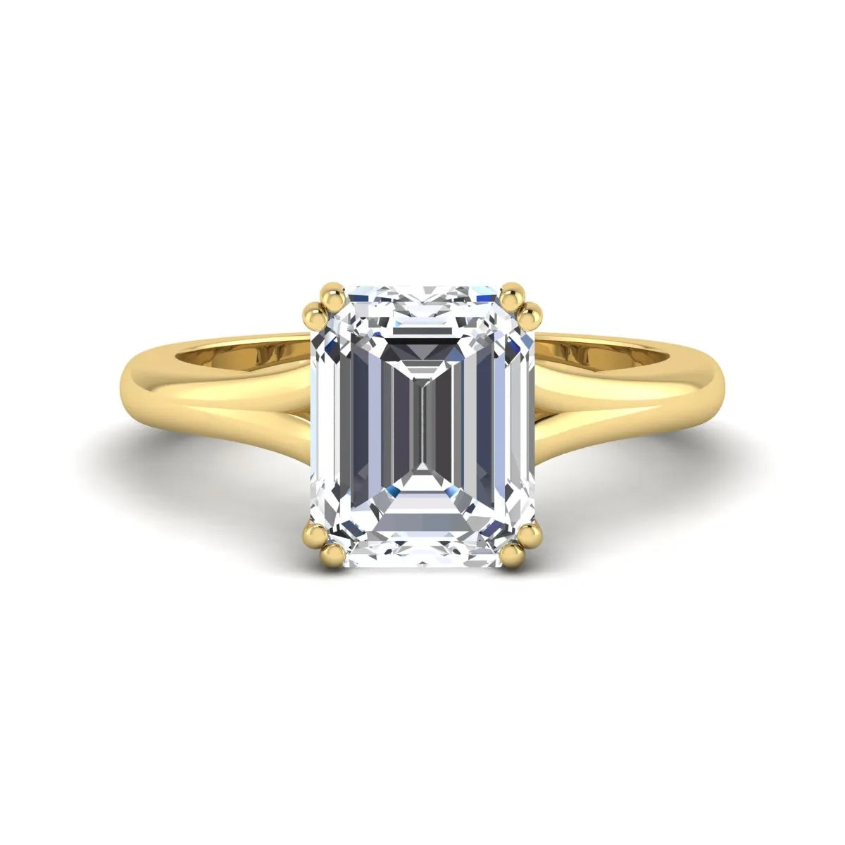 Emerald Cut Lab Grown Diamond Solitaire Engagement Ring featuring an IGI certified emerald cut center diamond in a four-prong setting with a yellow gold tone band.