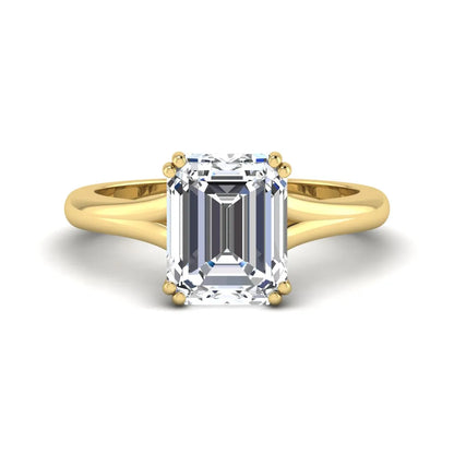 Emerald Cut Lab Grown Diamond Solitaire Engagement Ring featuring an IGI certified emerald cut center diamond in a four-prong setting with a yellow gold tone band.