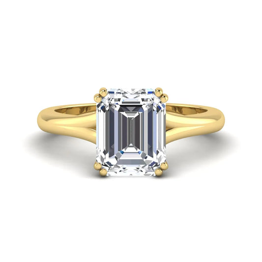 Emerald Cut Lab Grown Diamond Solitaire Engagement Ring featuring an IGI certified emerald cut center diamond in a four-prong setting with a yellow gold tone band.