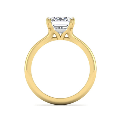 Emerald Cut Lab Grown Diamond Solitaire Engagement Ring featuring an IGI certified emerald cut center diamond in a four-prong setting with a yellow gold tone band.