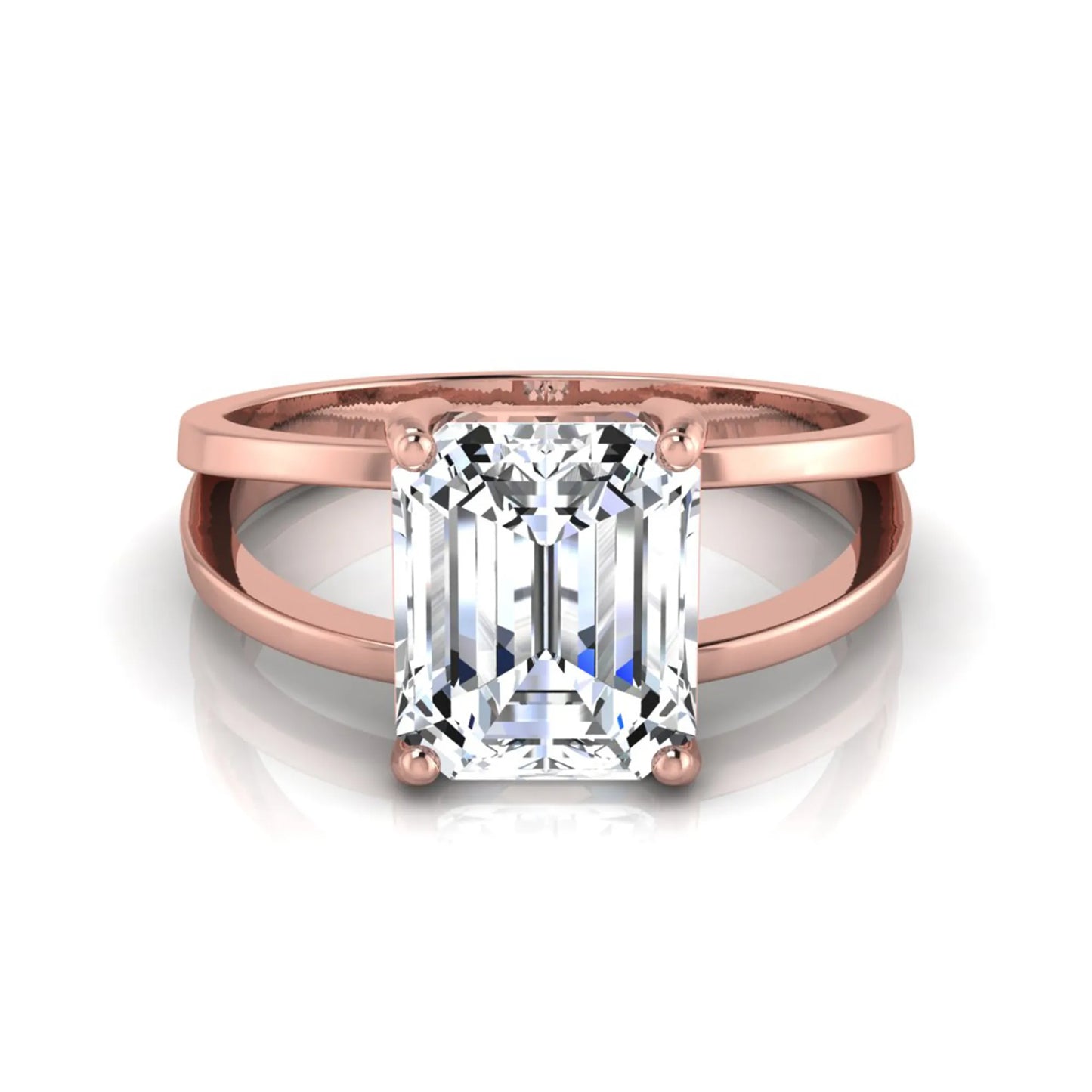 Emerald cut lab grown diamond split shank engagement ring featuring a classic four-prong setting and polished rose gold style band.