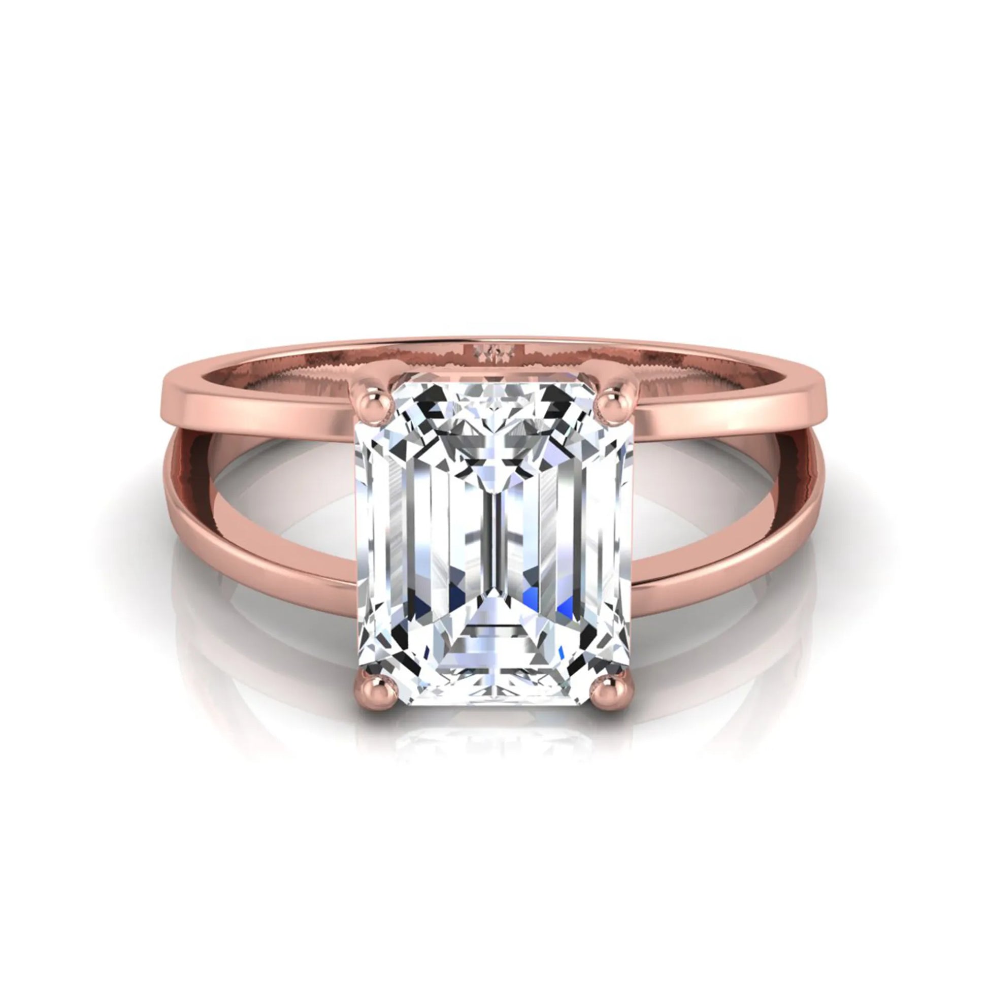 Emerald cut lab grown diamond split shank engagement ring featuring a classic four-prong setting and polished rose gold style band.