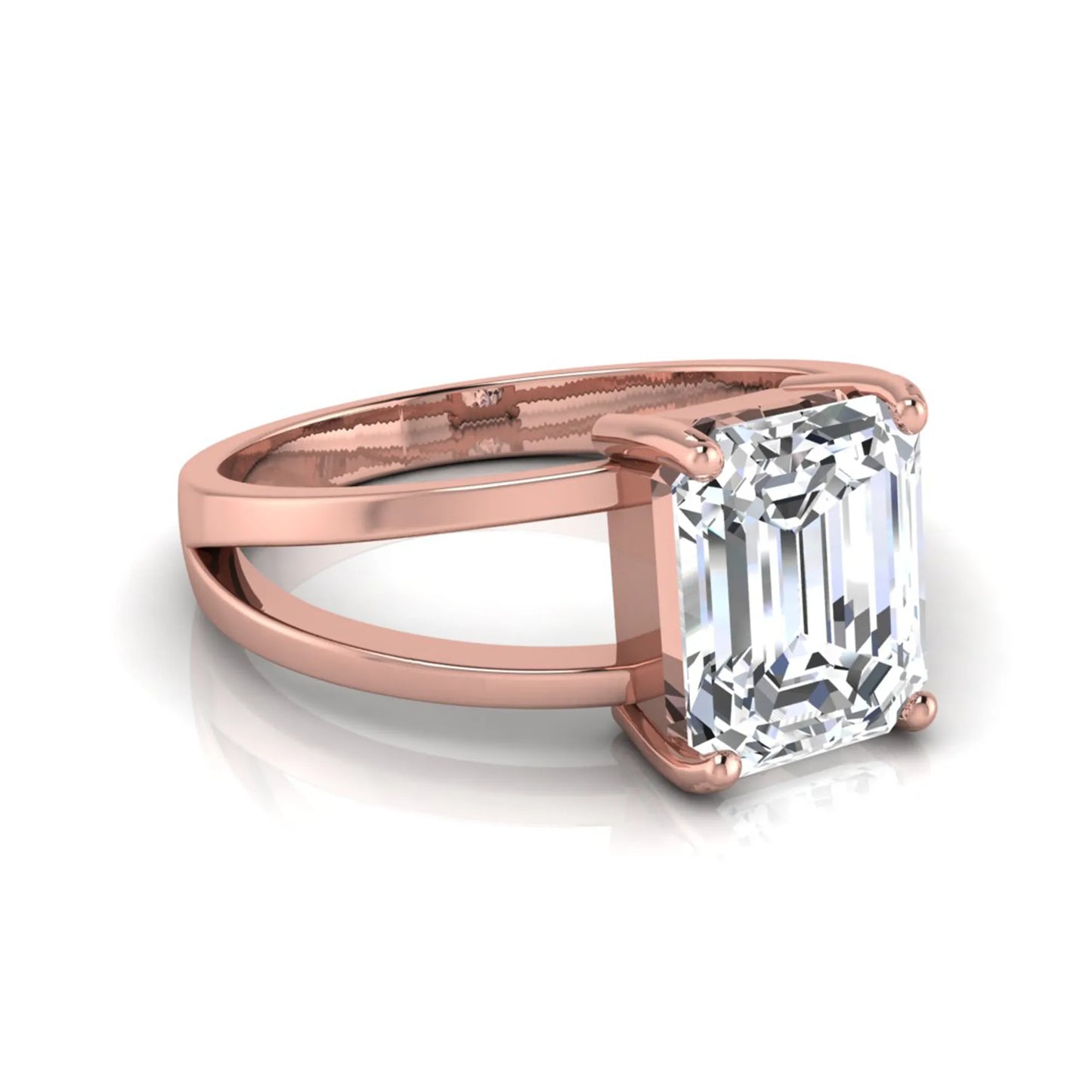 Emerald cut lab grown diamond split shank engagement ring featuring a classic four-prong setting and polished rose gold style band.