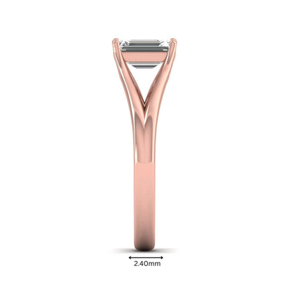 Emerald Cut Split Shank Solitaire Lab Grown Diamond Engagement Ring featuring a 1.75 carat IGI Certified emerald cut diamond in a four-prong setting with an elegant split shank band in rose gold