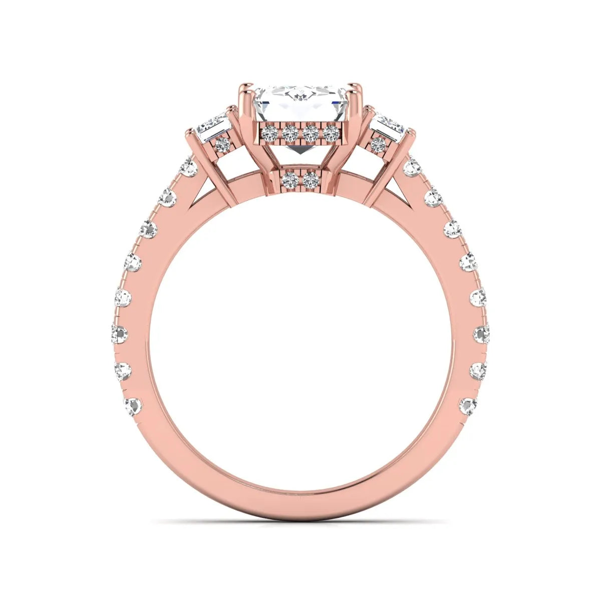 Emerald cut three stone lab grown diamond engagement ring in rose gold featuring a 2.62 carat IGI certified center diamond with emerald cut side stones and pavé band.
