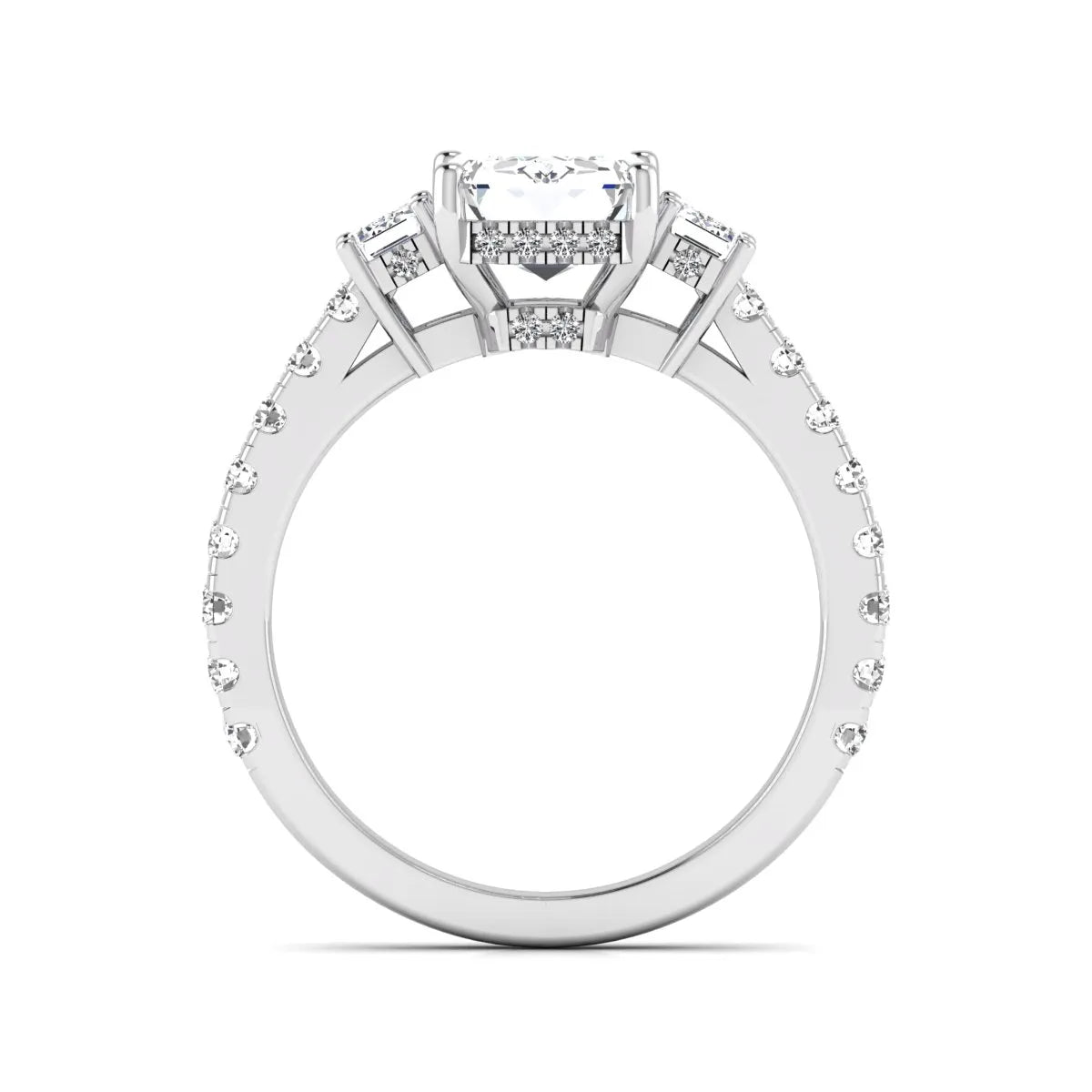 Emerald cut three stone lab grown diamond engagement ring in white gold featuring a 2.62 carat IGI certified center diamond with emerald cut side stones and pavé band.