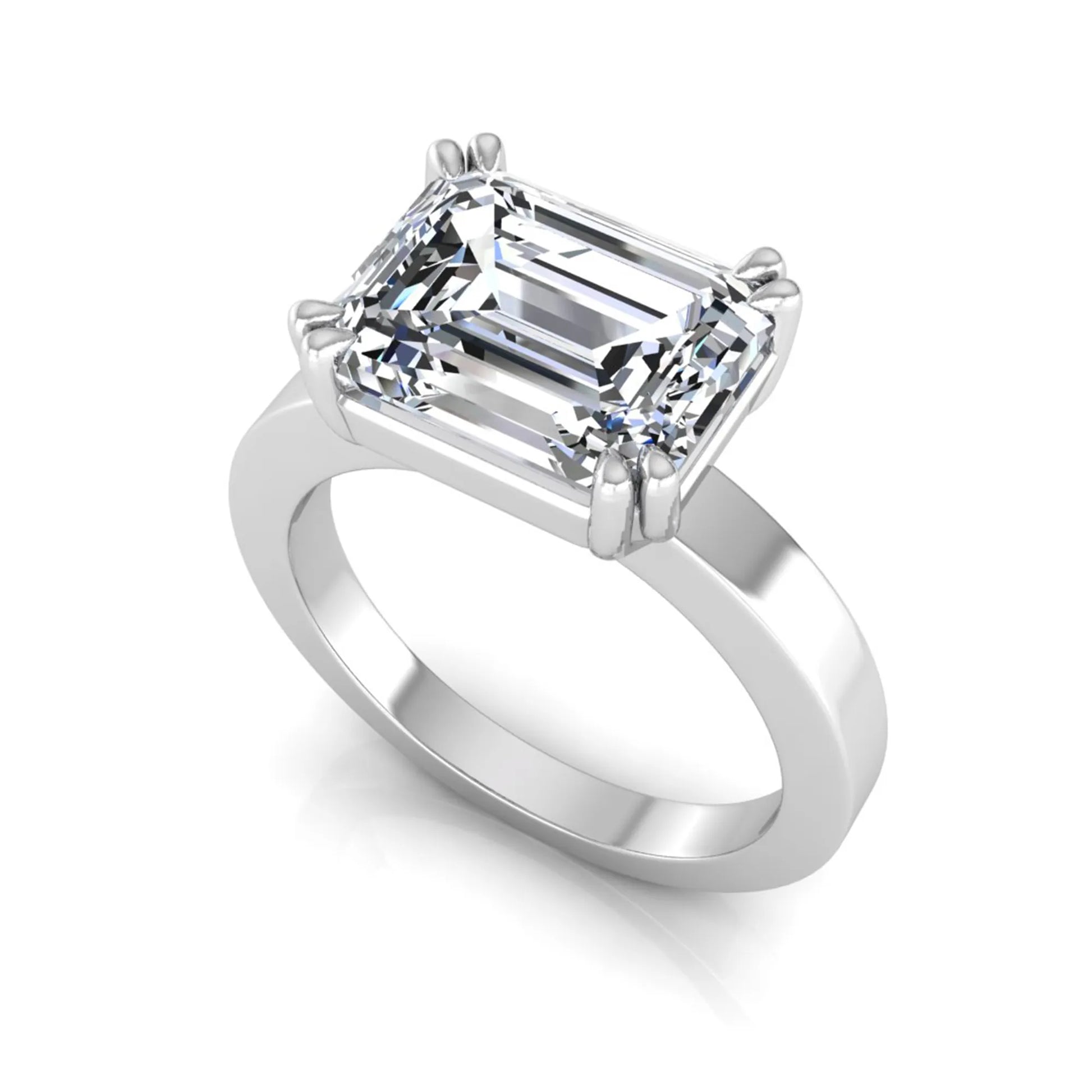 Emerald cut lab grown diamond solitaire engagement ring featuring a 3.79 carat IGI certified center diamond in a double claw prong setting with a white gold band.