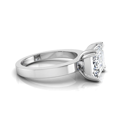 Emerald cut lab grown diamond solitaire engagement ring featuring a 3.79 carat IGI certified center diamond in a double claw prong setting with a white gold band.
