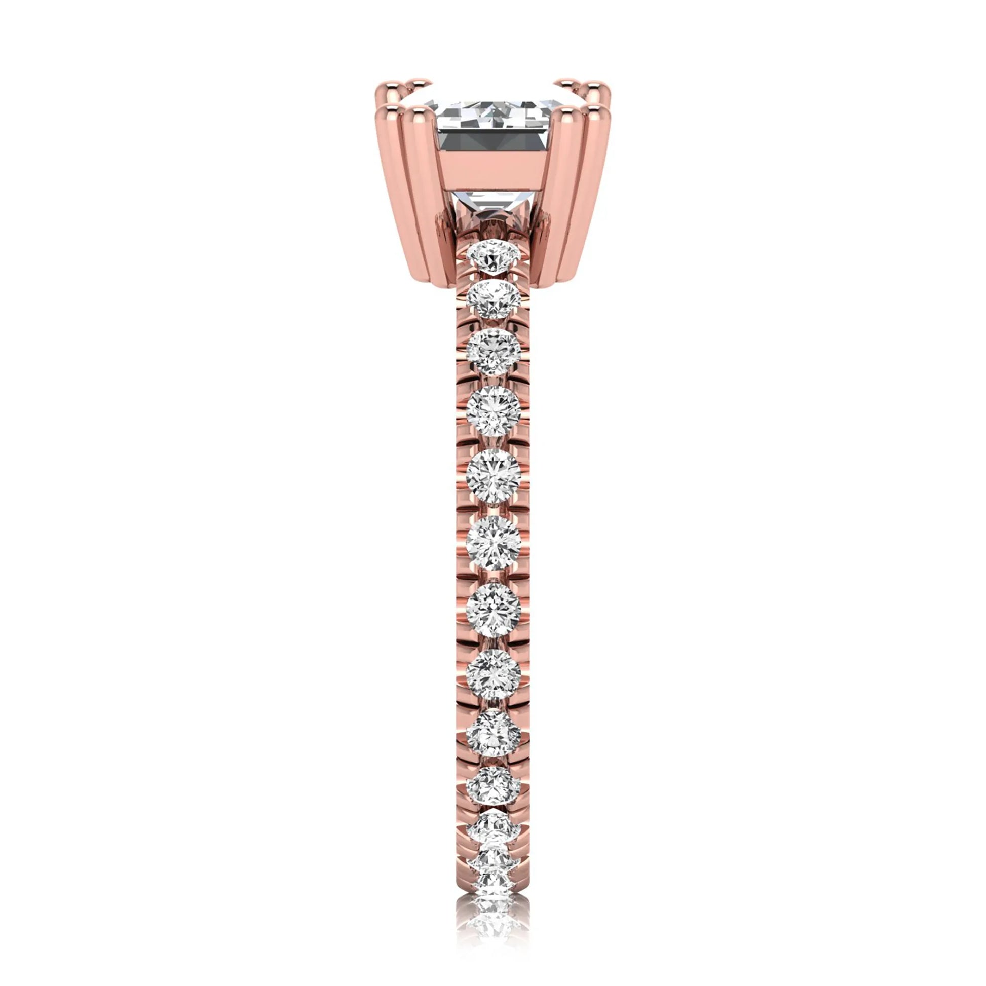 Emerald cut lab grown diamond side stone engagement ring featuring a four-prong setting with round accent diamonds in a rose gold tone design.