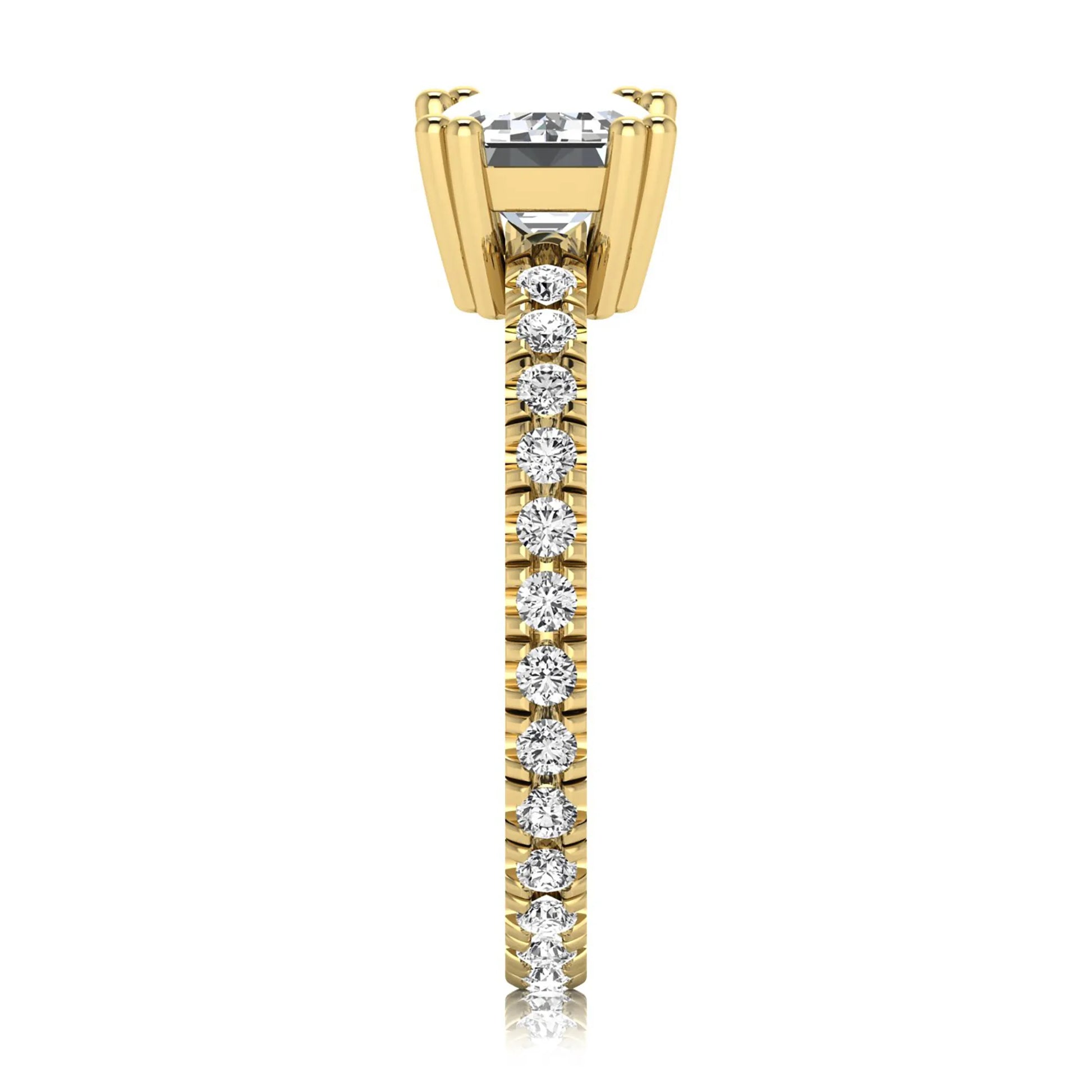 Emerald cut lab grown diamond side stone engagement ring featuring a four-prong setting with round accent diamonds in a yellow gold tone design.