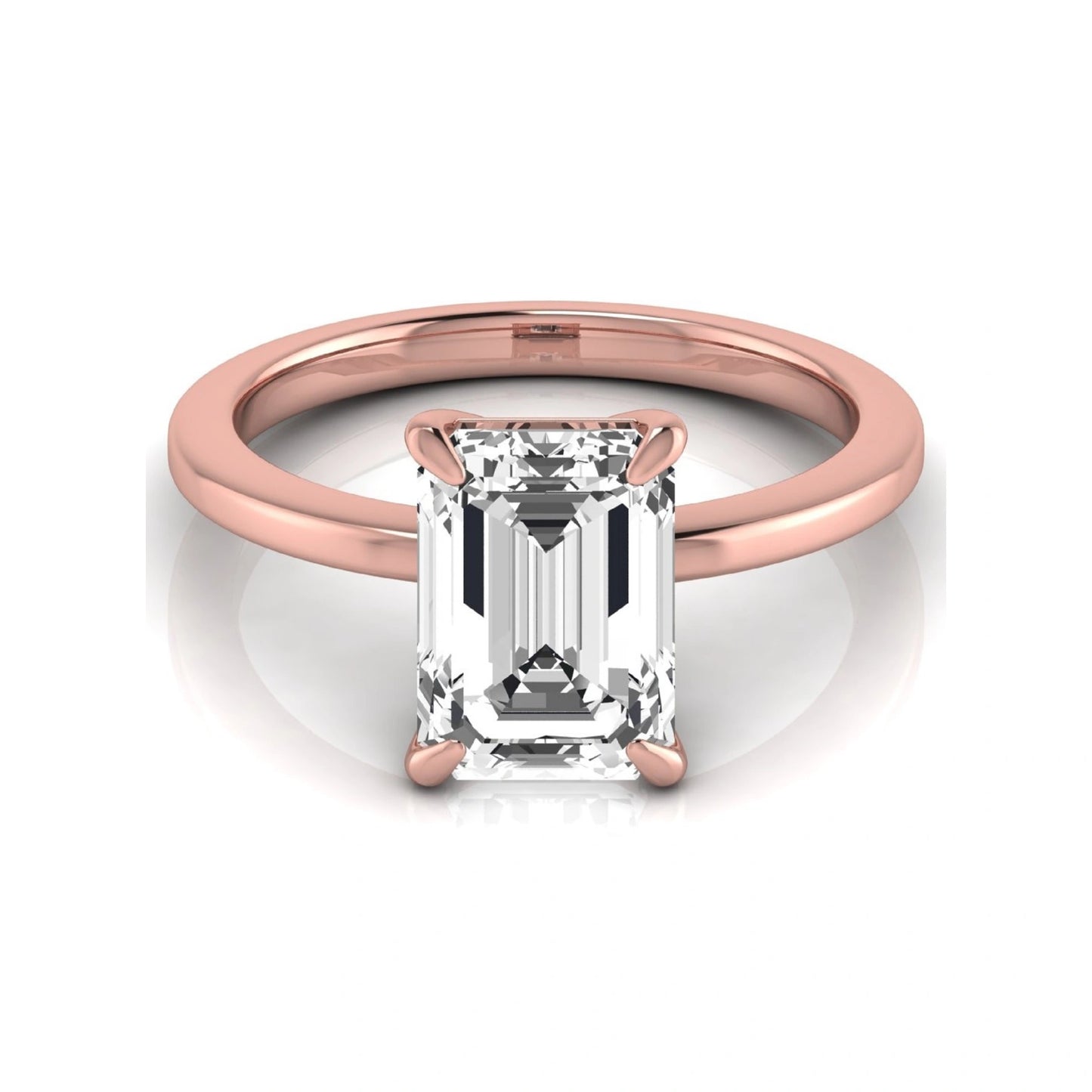 Emerald cut lab grown diamond solitaire engagement ring with a four prong setting in a rose gold tone, featuring an IGI certified 3.01 carat center diamond.