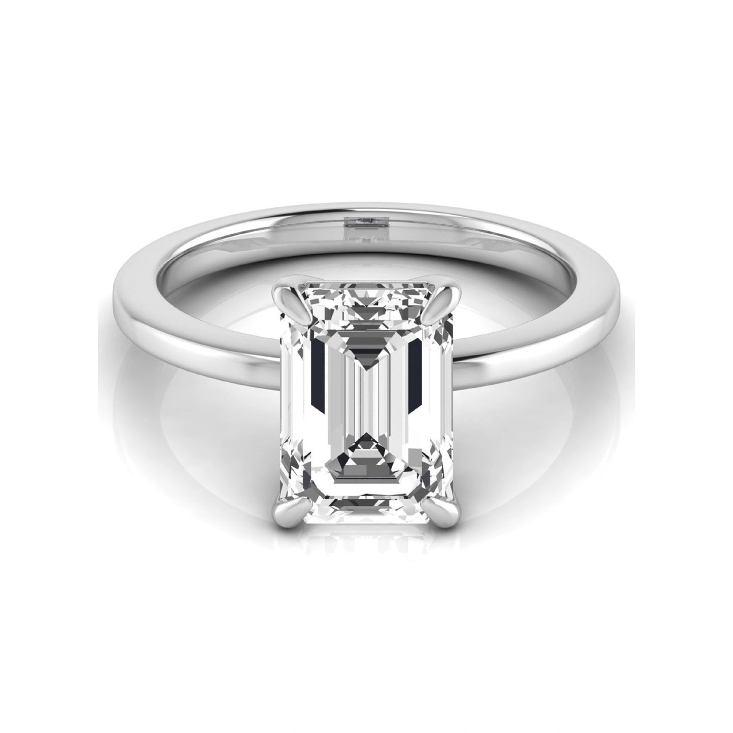 Emerald cut lab grown diamond solitaire engagement ring with a four prong setting in a white gold tone, featuring an IGI certified 3.01 carat center diamond.