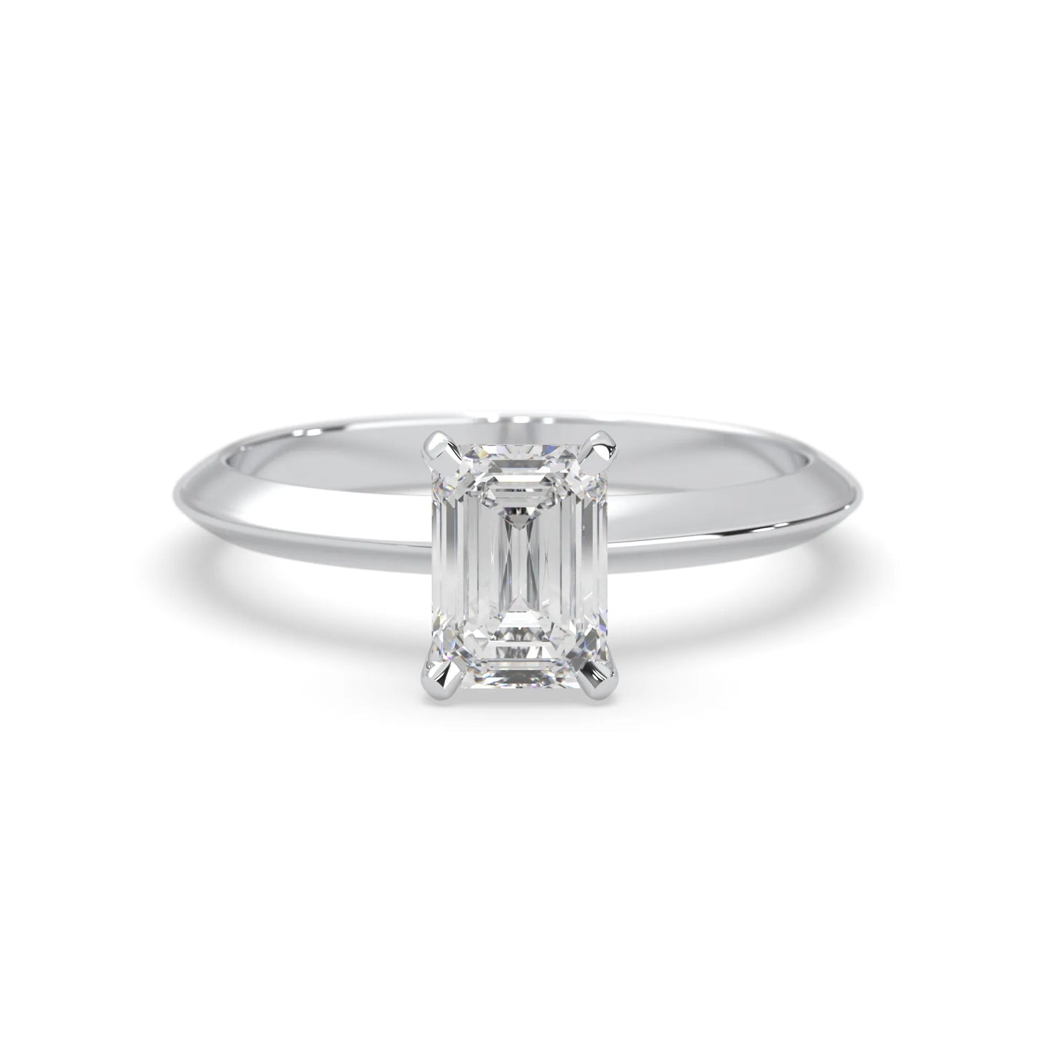 white-gold Diamond ring with emerald-cut gemstone on a white background