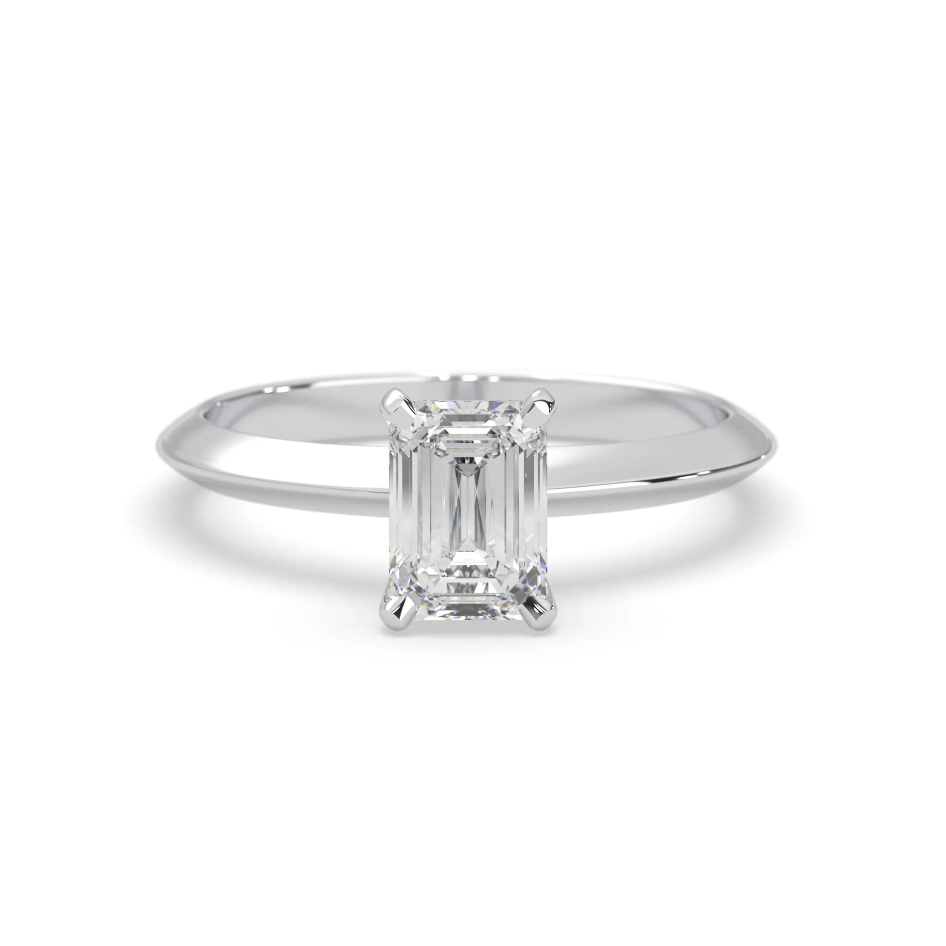 white-gold Diamond ring with emerald-cut gemstone on a white background