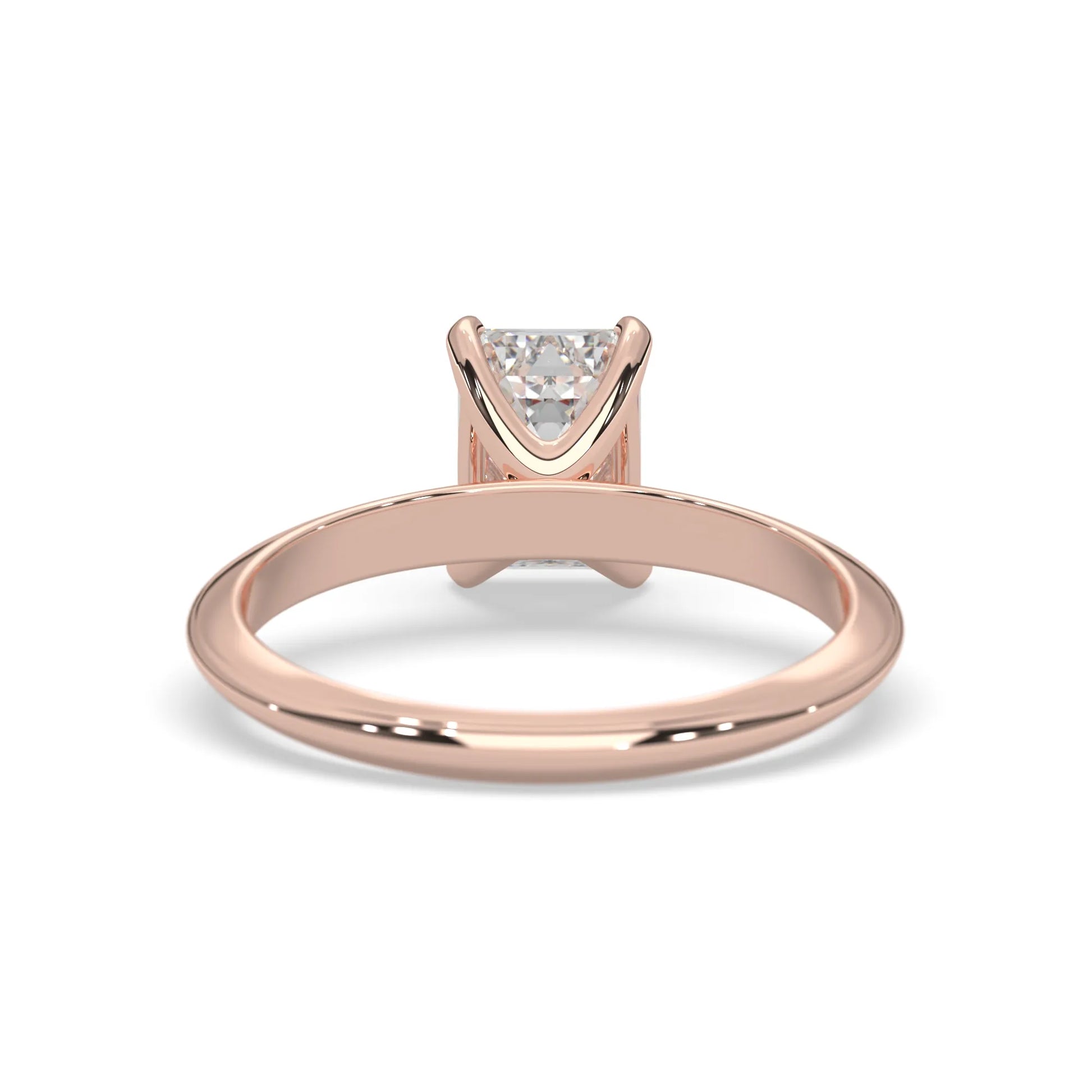 Rose-gold ring with a diamond on a white background