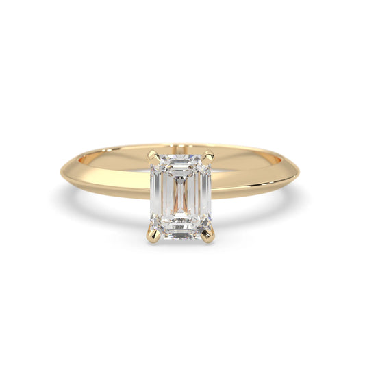 yellow-Gold ring with a rectangular diamond on a white background