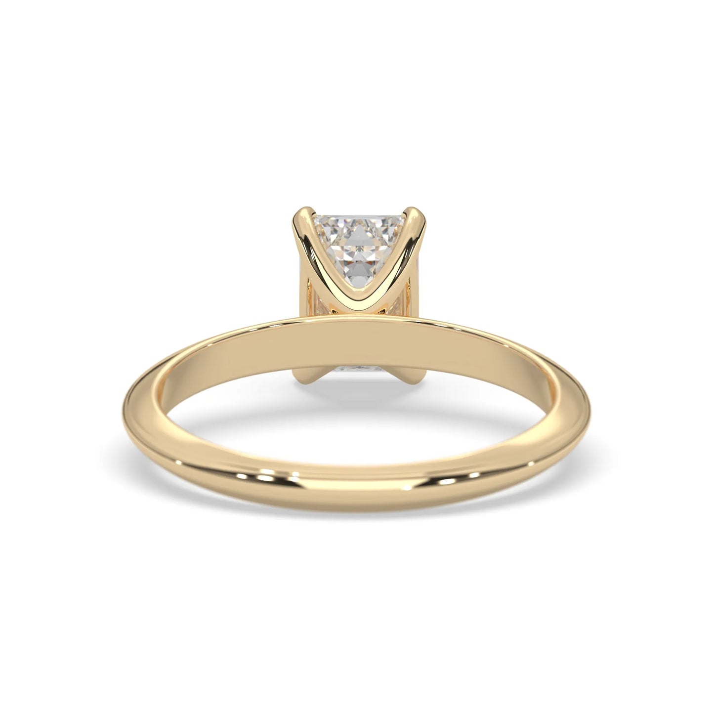 yellow-Gold ring with a triangular diamond on a white background