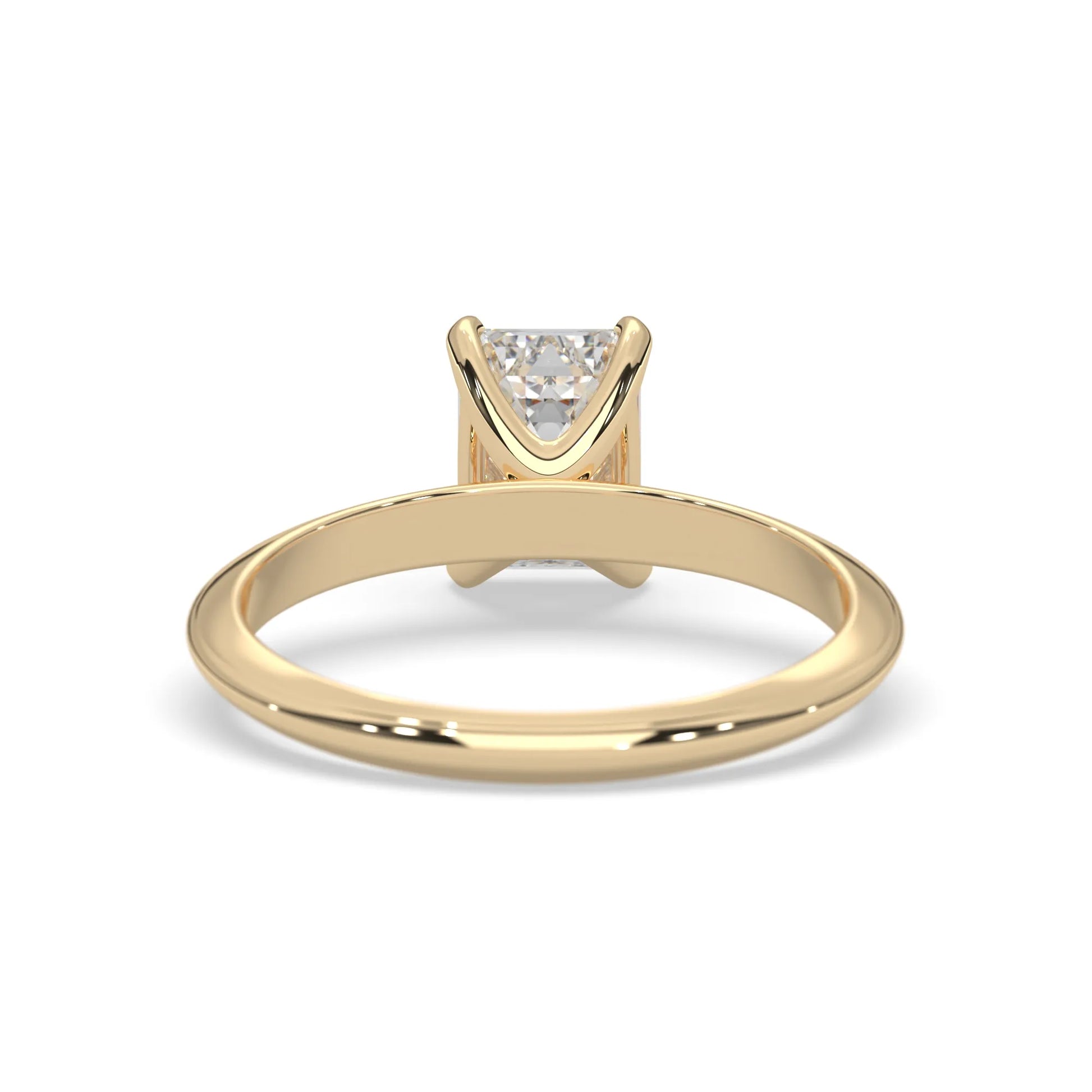 yellow-Gold ring with a triangular diamond on a white background