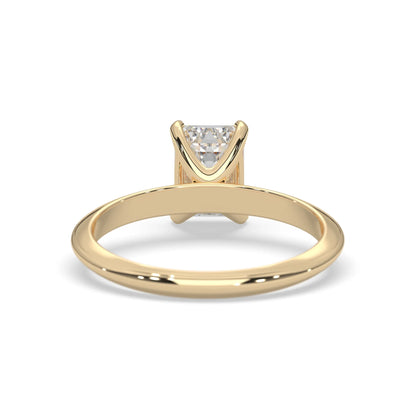 yellow-Gold ring with a triangular diamond on a white background
