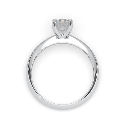 white-gold ring with a heart-shaped diamond on a white background