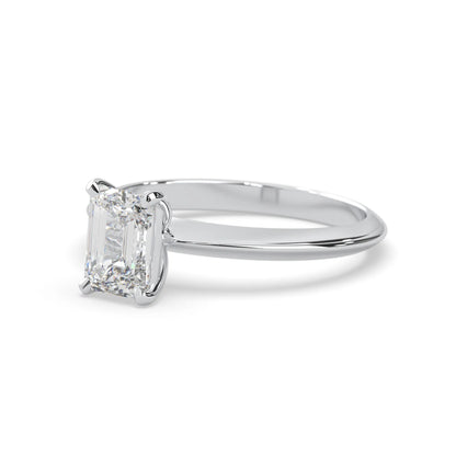 white-gold Diamond ring with a rectangular stone on a white background