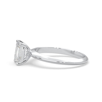 white-gold Diamond ring with a rectangular stone on a white background