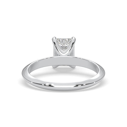 white-gold ring with a diamond on a white background