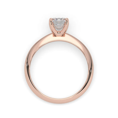 Rose-gold ring with a diamond on a white background