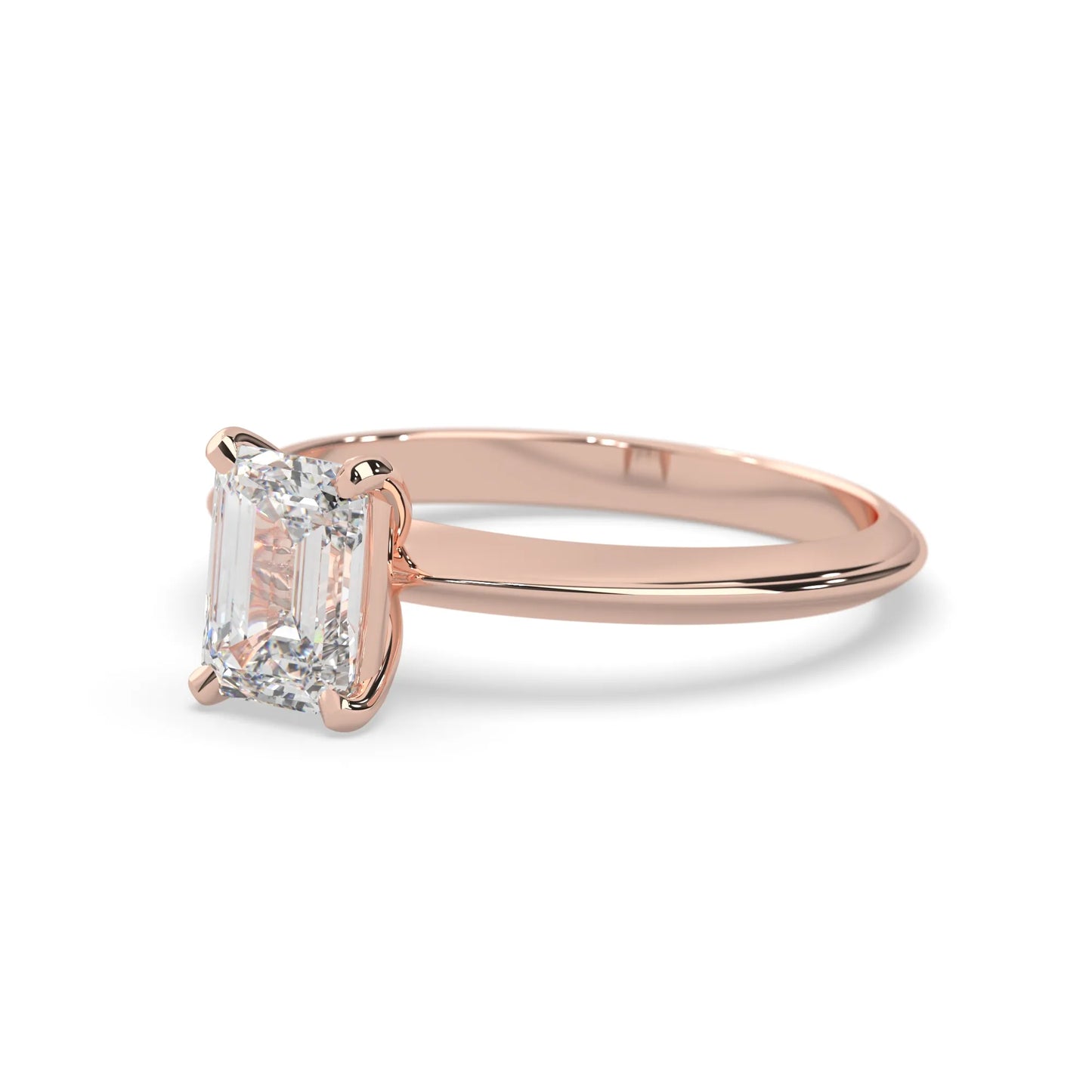 Rose-gold ring with a diamond on a white background