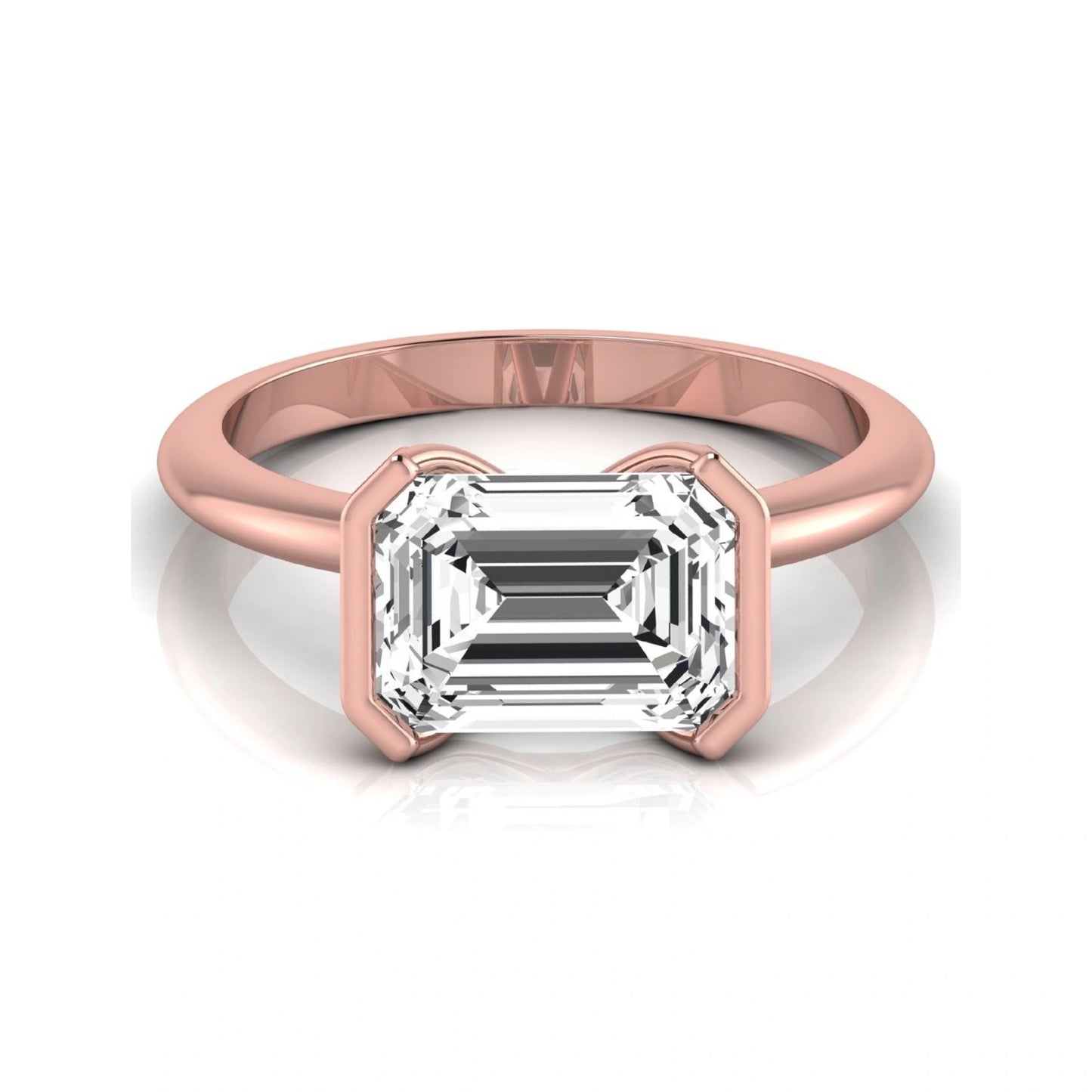 Emerald cut lab grown diamond engagement ring featuring a 5.00 carat center diamond in a modern half bezel solitaire setting with a polished rose gold tone band.