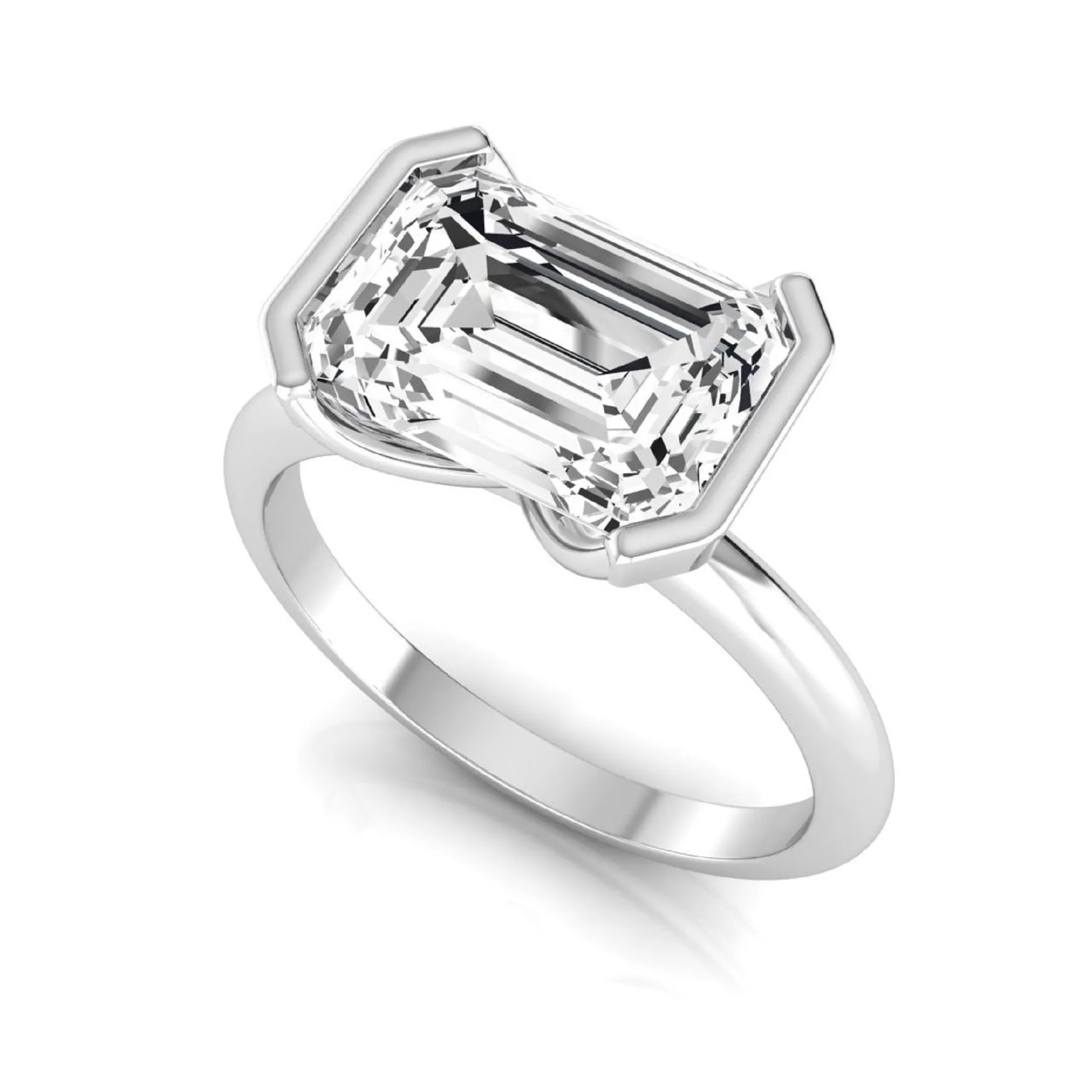 Emerald cut lab grown diamond engagement ring featuring a 5.00 carat center diamond in a modern half bezel solitaire setting with a polished white gold tone band.