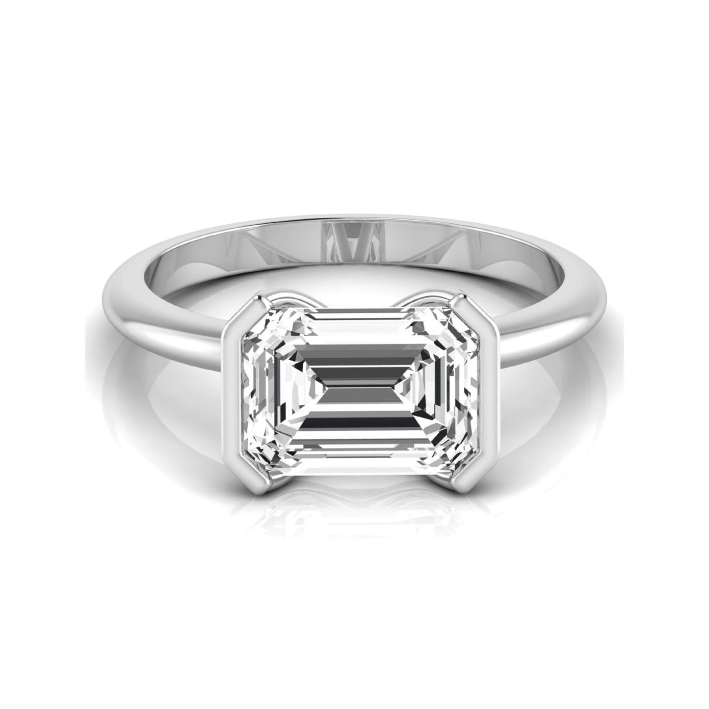 Emerald cut lab grown diamond engagement ring featuring a 5.00 carat center diamond in a modern half bezel solitaire setting with a polished white gold tone band.