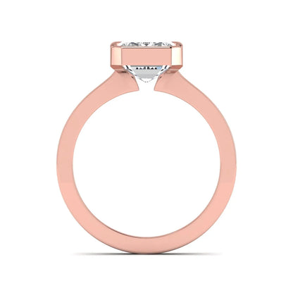 Emerald cut lab grown diamond half bezel solitaire engagement ring in rose gold setting