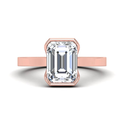 Emerald cut lab grown diamond half bezel solitaire engagement ring in rose gold setting
