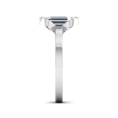 Emerald cut lab grown diamond half bezel solitaire engagement ring in white gold setting