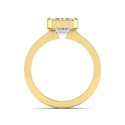 Emerald cut lab grown diamond half bezel solitaire engagement ring in yellow gold setting